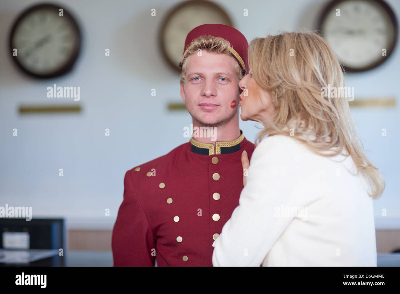 Older woman kissing young man hi-res stock photography and images - Alamy