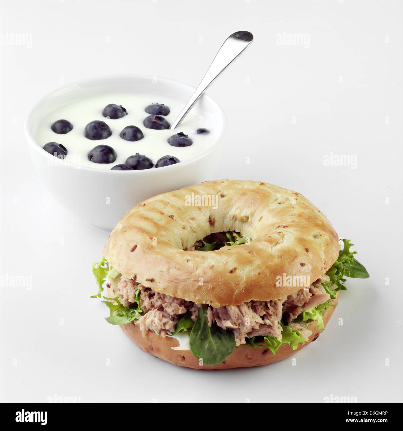 Tuna Bagel Sandwich and Blueberry Yoghurt Stock Photo Alamy