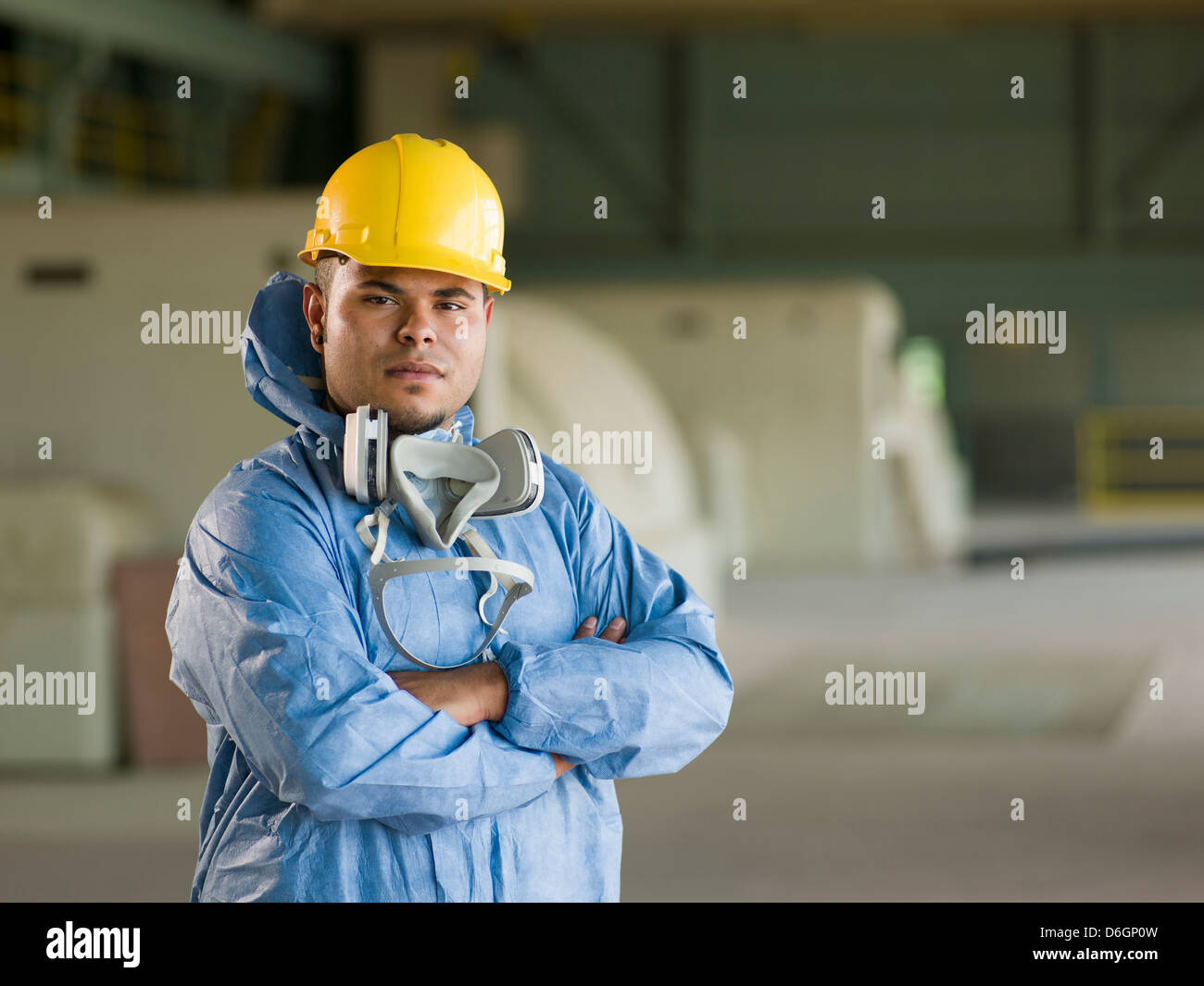 Engineer wearing protective suit on site Stock Photo