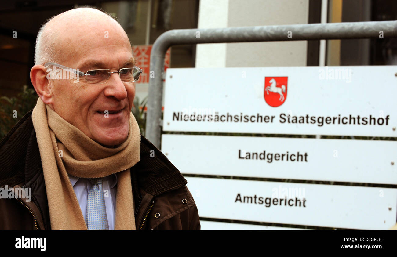 SPD politician Heiner Bartling poses for a picture in front of the Lower Saxon regional court in