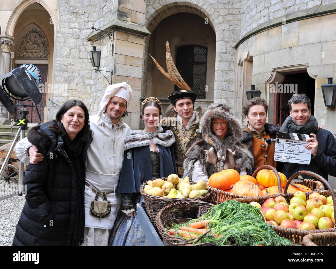 Producer Elke Ried, actors Fritz Karl, Nina Gummich, André Kaczmarczyk, Henriette Confurius, Adrian Topol and director Christian Theede pose on the set of the fairy tale 'Allerleirauh' ('All-Kinds-of-Fur') by the Brothers Grimm at Marienburg Castle near Schulenberg, Germany, 22 February 2012. With the movie, the German Broadcaster ARD is starting the fifth season of its successful  Stock Photo