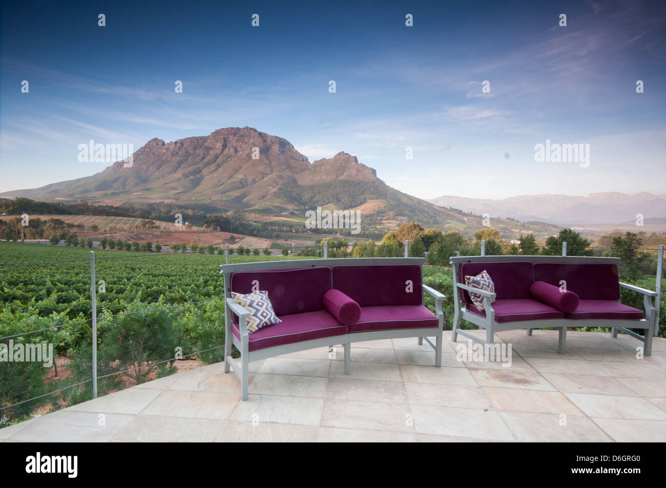 Posh restaurant ia a Vineyards in Stellenbosch, Western Cape, South Africa. Simonsberg mountain range as a backdrop. In the last Stock Photo