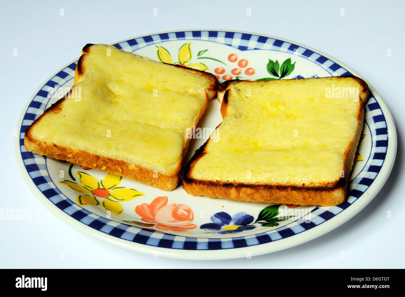Two rounds of cheese on toast Stock Photo Alamy
