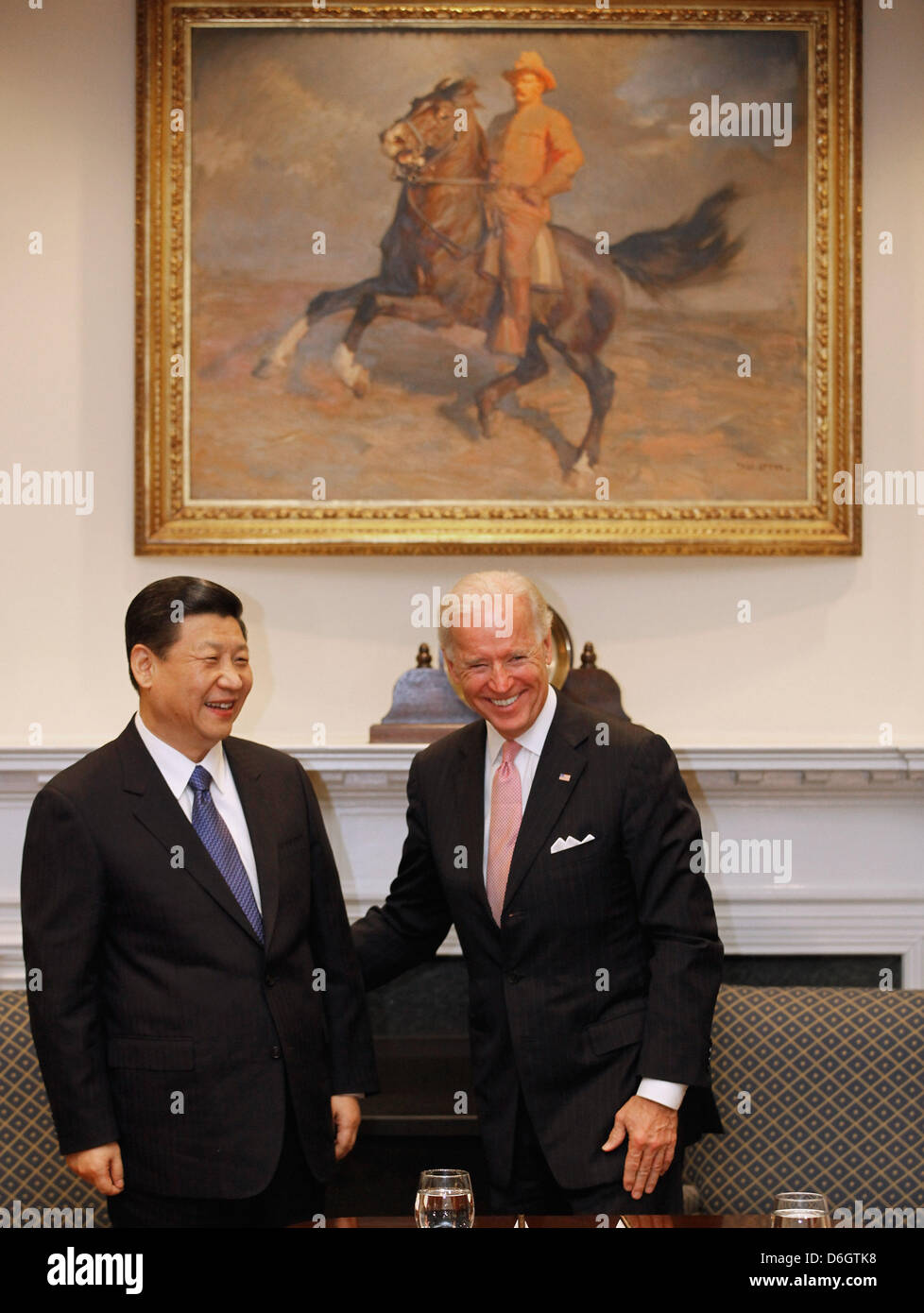 United States Vice President Joe Biden (R) and Vice President Xi Jinping of China hold  an expanded bilateral meeting with other U.S. and Chinese officials in the Roosevelt Room at the White House in Washington, DC, USA, 14 February 2012. While in Washington, Vice President Xi will meet with Biden, President Barack Obama and other senior Administration officials to discuss a broad  Stock Photo