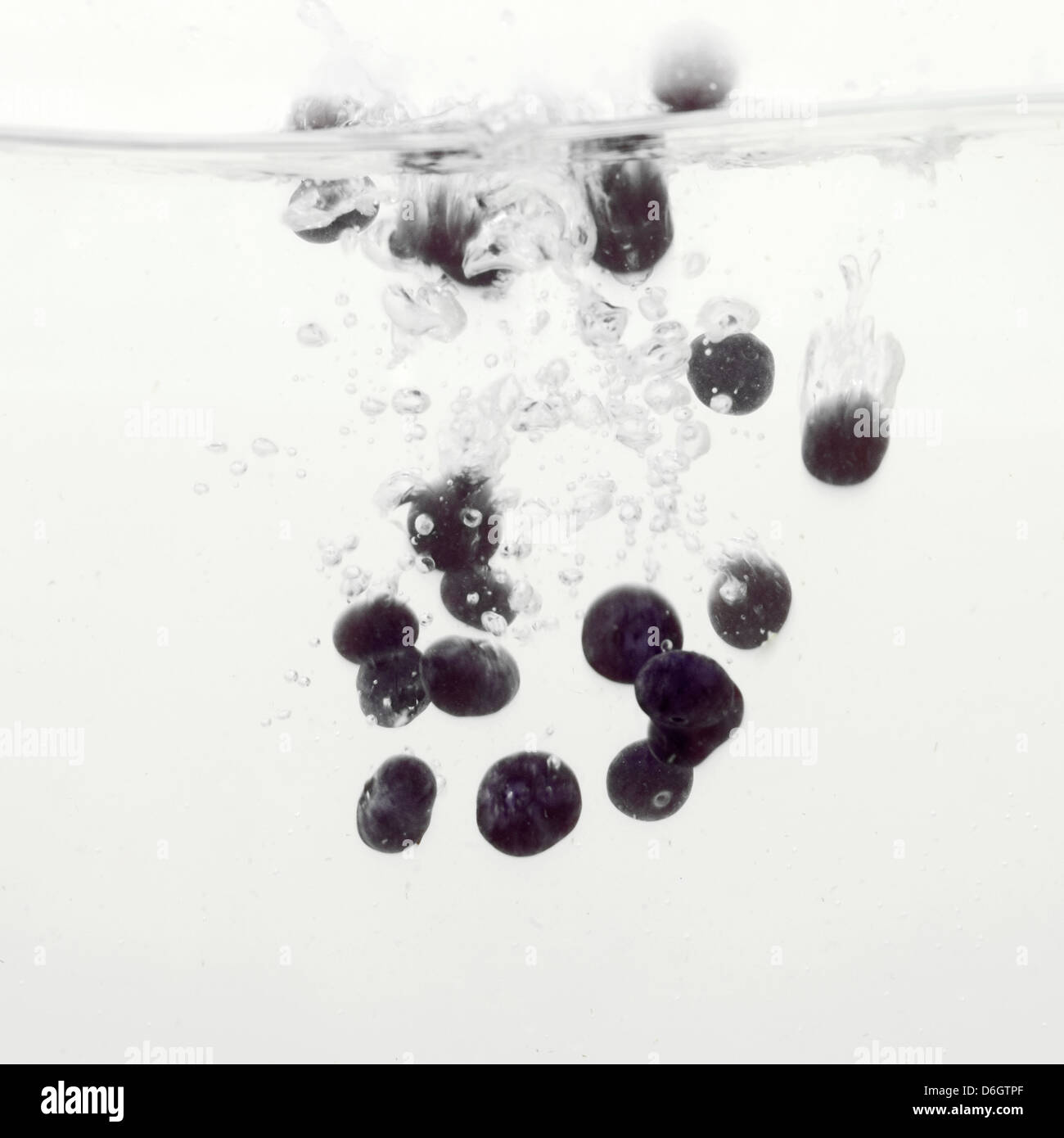 Blueberries splashing into water Stock Photo Alamy