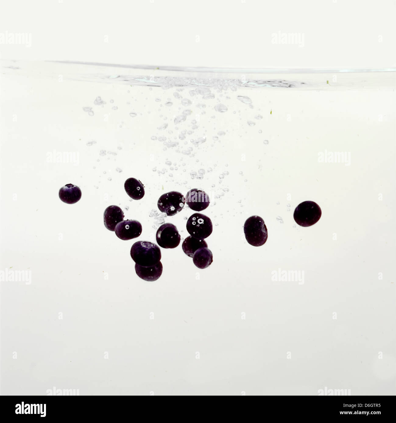 Blueberries splashing into water Stock Photo Alamy