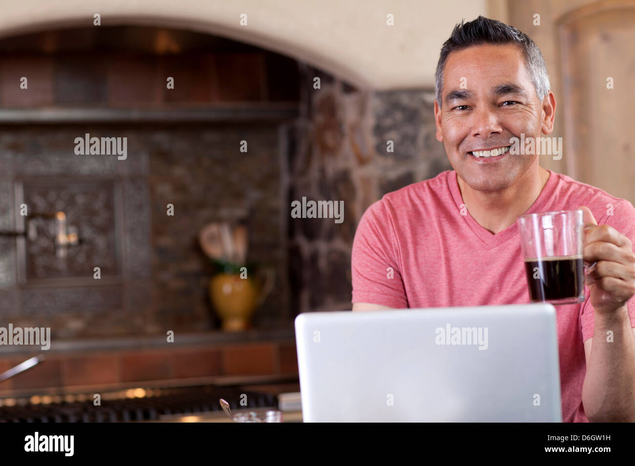 Man home laptop eye contact hi-res stock photography and images - Alamy