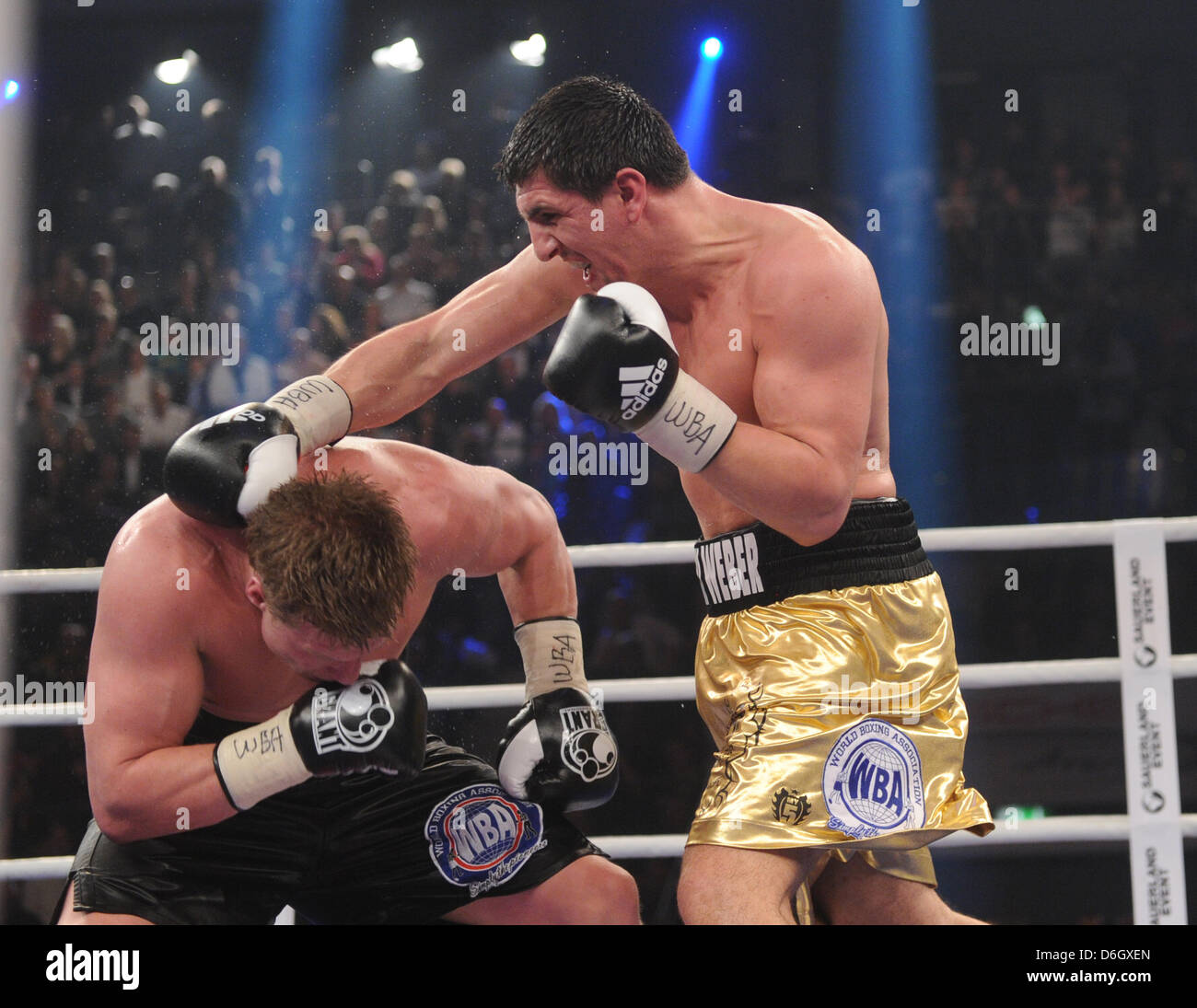 German boxer Marco Huck (R) fights against Russian boxer Alexander Povetkin  during the WBA world heavyweight