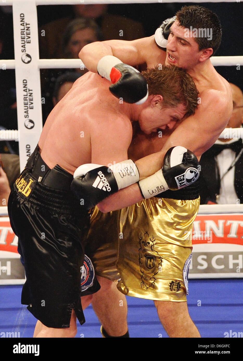 German boxer Marco Huck (R) fights against Russian boxer Alexander Povetkin during the WBA world heavyweight boxing championship match at the Porsche-Arena in Stuttgart, Germany, 25 February 2012. Povetkin won the heavyweight title by majority decision. Photo: Jan-Philipp Strobel Stock Photo