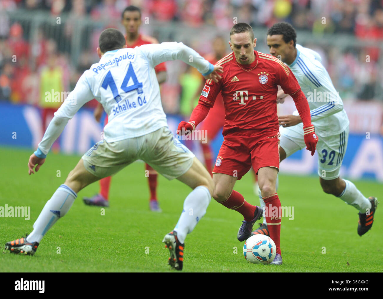 Munich's Franck Ribery (C) vies for the ball with Schalke's Kyriakos Papadopoulos (L) and Joel Matip during the Bundesliga soccer match between FC Bayern Munich and FC Schalke 04 at Allianz-Arena in Munich, Germany, 26 February 2012. Photo: PETER KNEFFEL  (ATTENTION: EMBARGO CONDITIONS! The DFL permits the further utilisation of the pictures in IPTV, mobile services and other new t Stock Photo