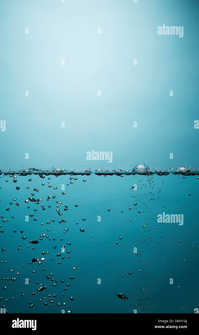 Bubbles floating in water Stock Photo Alamy