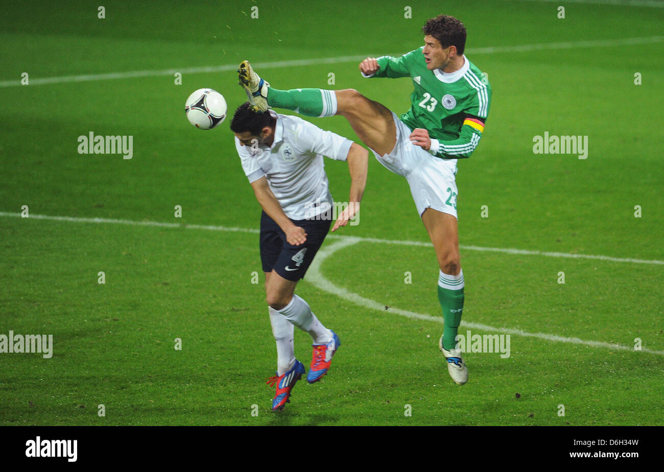 Germany's Mario Gomez (R) and Adil Rami of France fight for the ball during the international friendly soccer match Germany vs France at the Weser stadium in Bremen, Germany, 29 February 2012. Photo: Julian Stratenschulte dpa/lni  +++(c) dpa - Bildfunk+++ Stock Photo