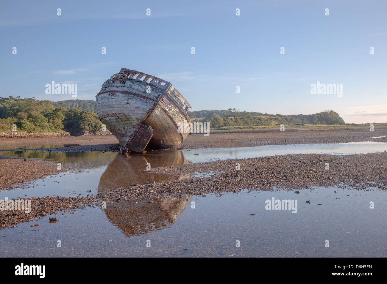 Shipwrecked  Boat Dulas Beach Anglesey Wales UK Stock Photo