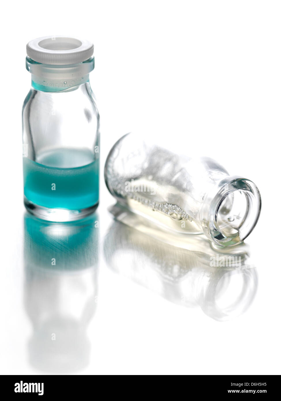 Glass bottles of liquid Stock Photo