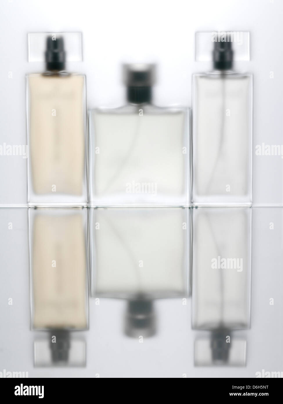 Blurred view of perfume bottles Stock Photo