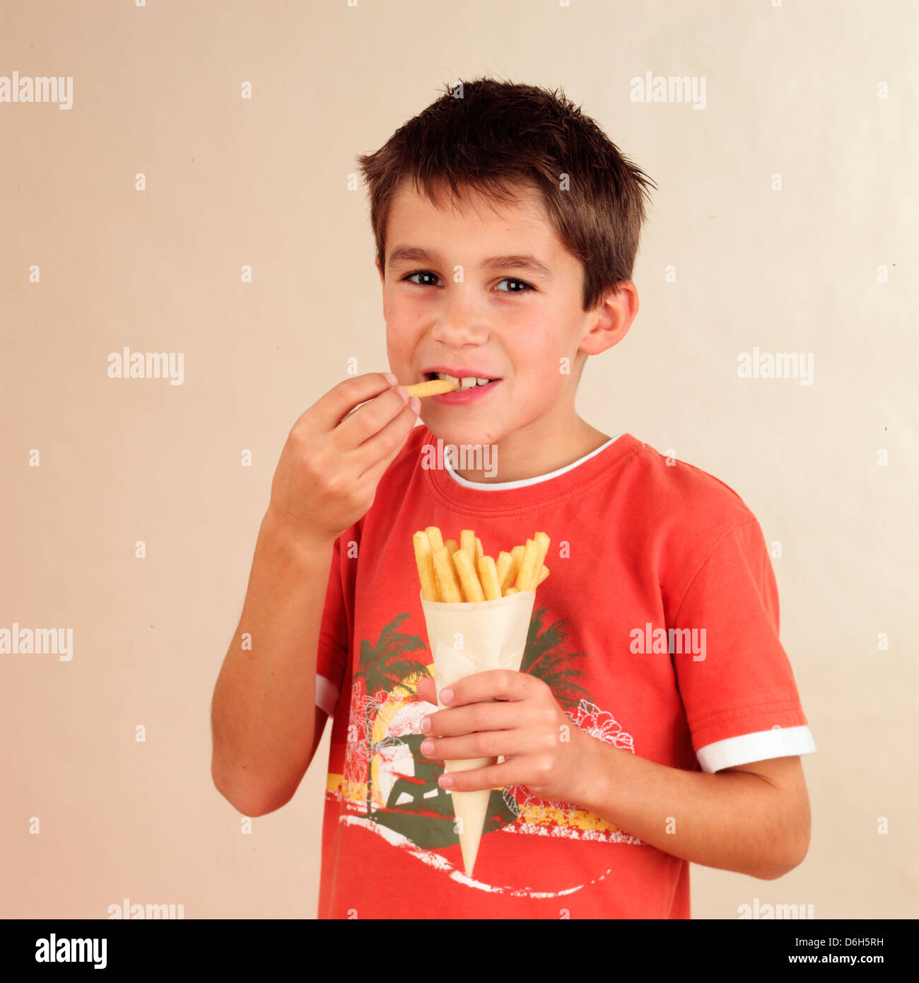 Child eating pastry sticks Stock Photo Alamy