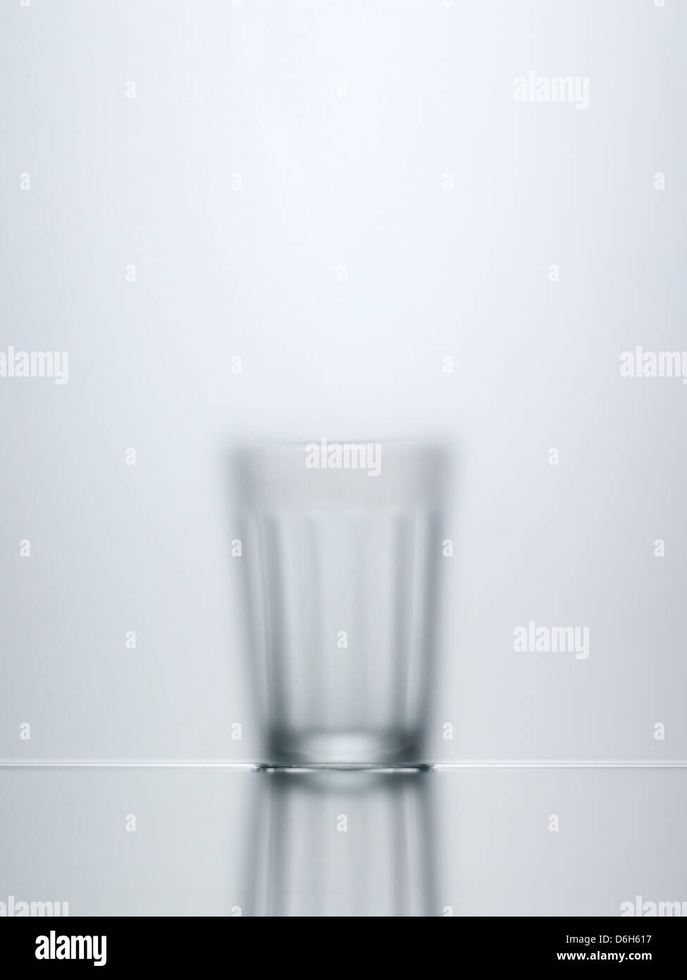 Blurred view of water glass Stock Photo