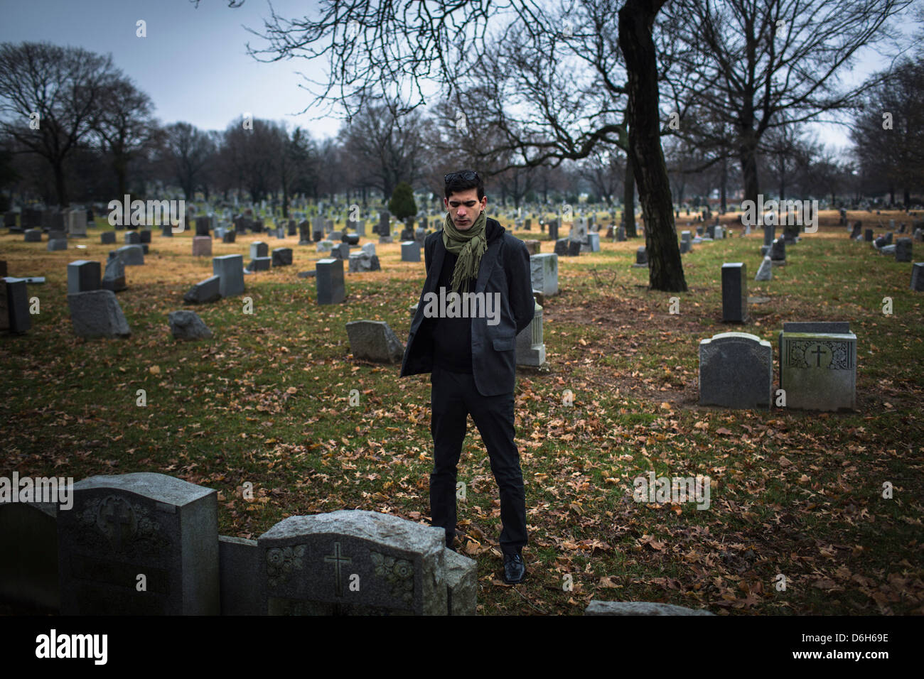 Man visiting graveyard Stock Photo Alamy