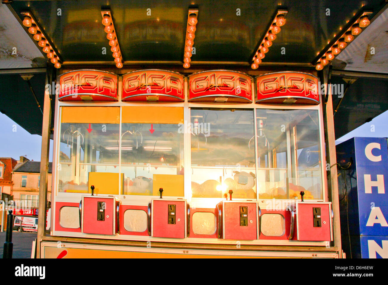 Claw prize game slot machine on seafront Stock Photo