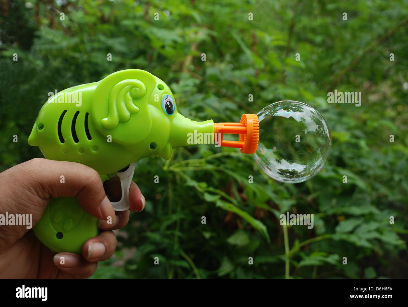 a hand operated bubble blower Stock Photo Alamy