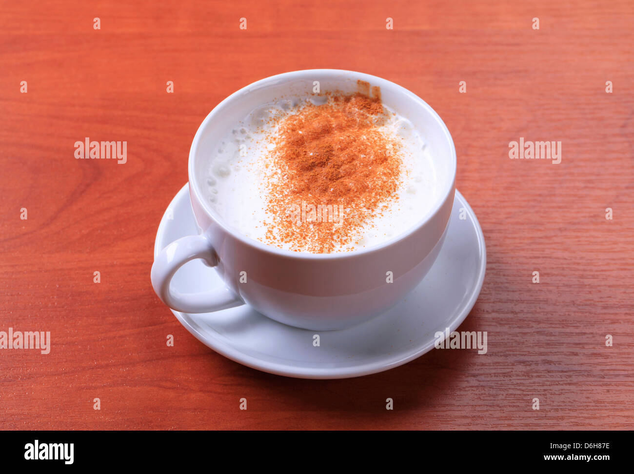 Cup of hot milk with nutmeg or cinnamon Stock Photo Alamy