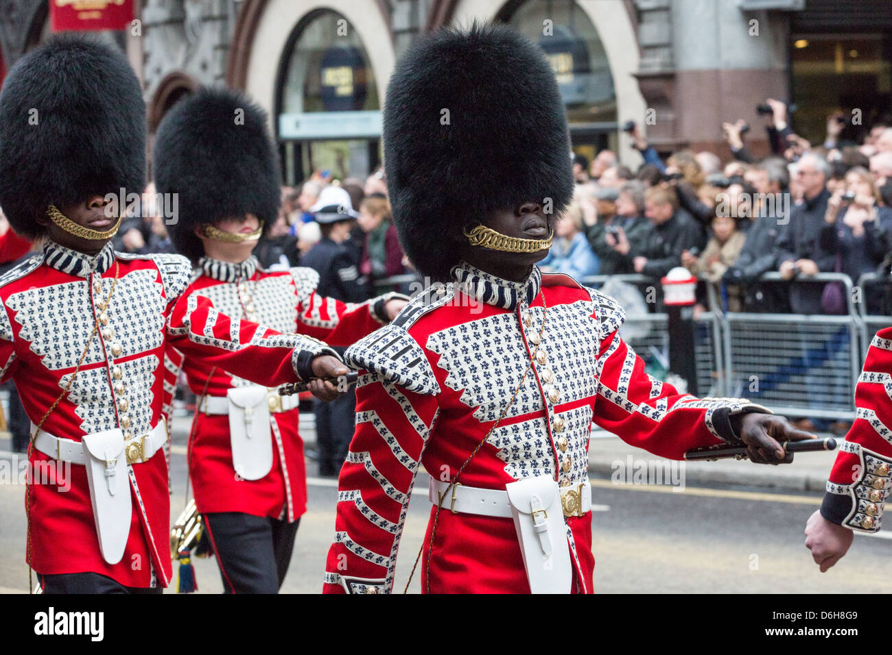 Members of the Queen's Guard march towards St Paul's Cathedral as part of the procession for Margaret Thatcher's funeral. Stock Photo