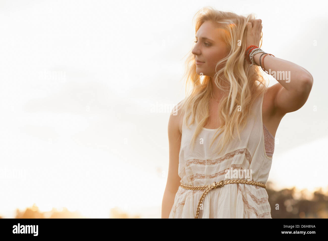 Woman standing field blond hair hi-res stock photography and images - Alamy