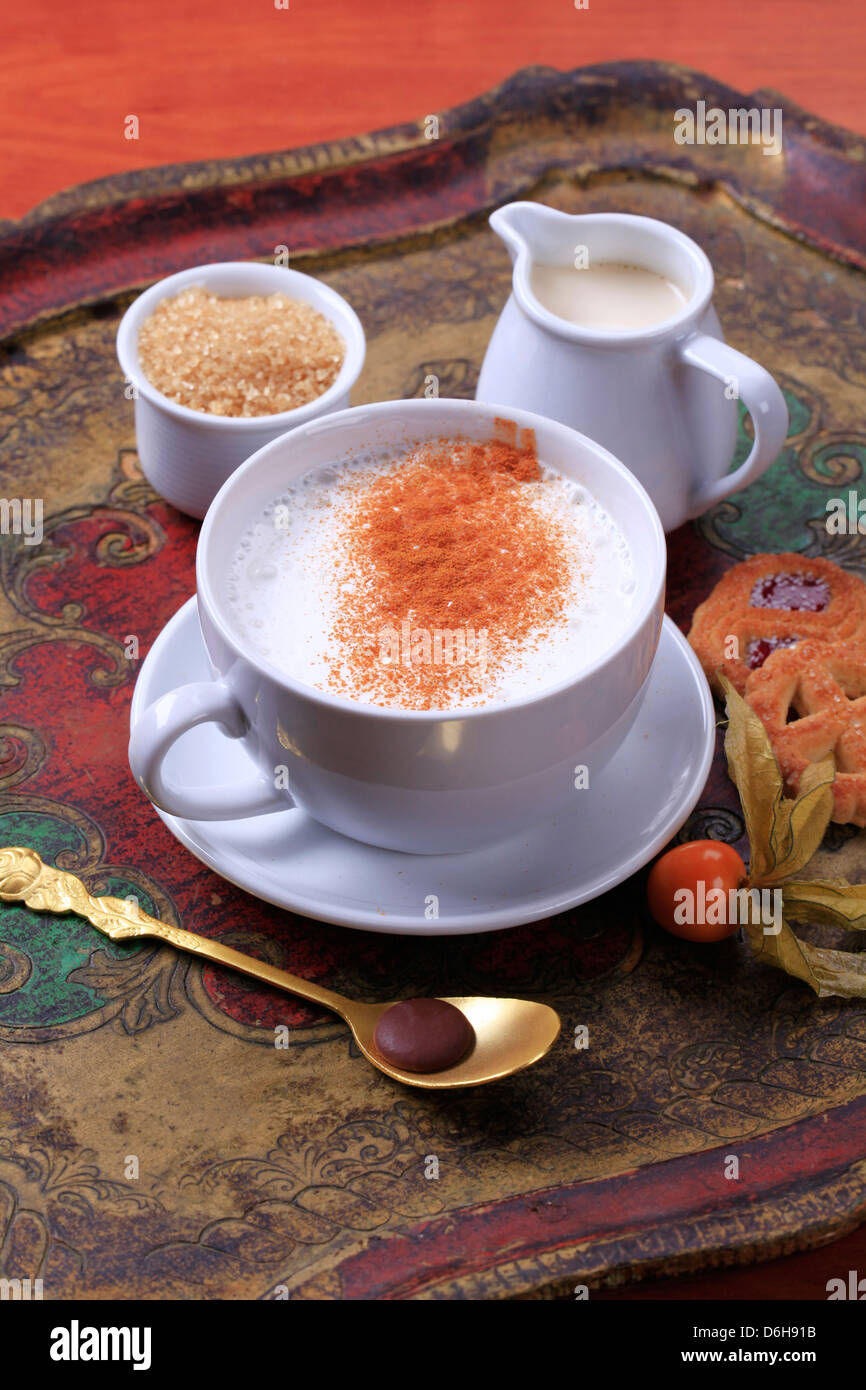 Cup of hot milk with nutmeg and brown sugar Stock Photo Alamy