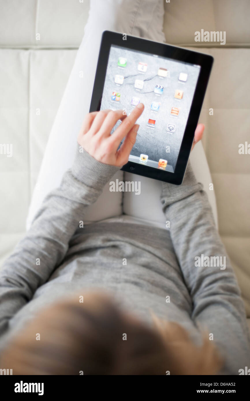 Woman using a tablet computer Stock Photo