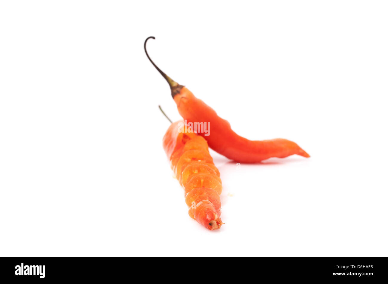 Yellow hot chili peppers on a white background Stock Photo - Alamy