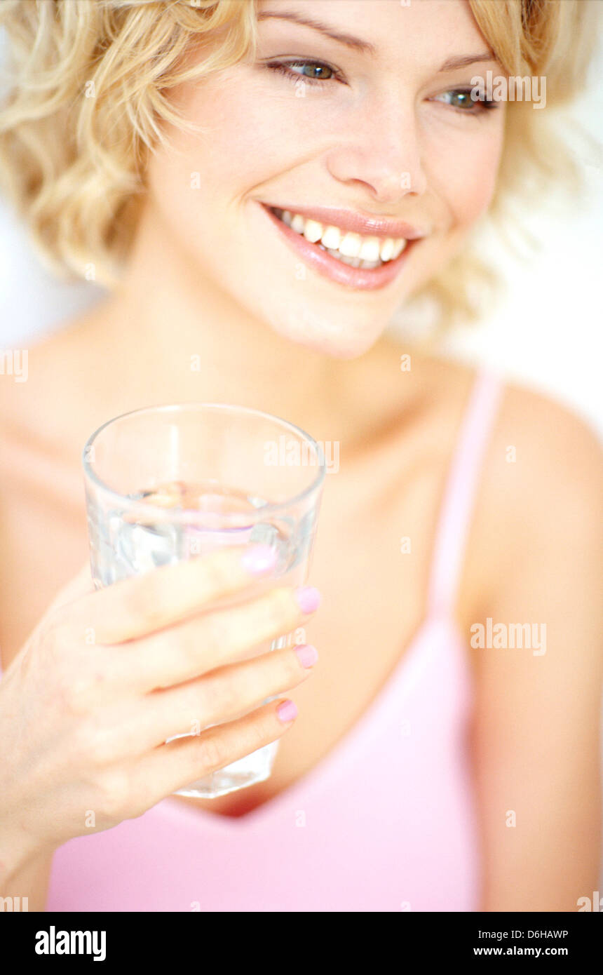 Woman with a glass of water Stock Photo