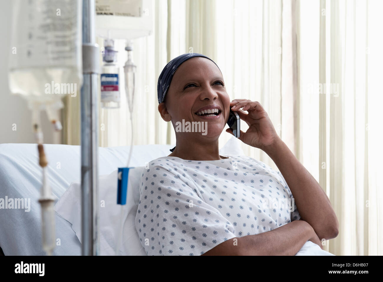 Female hospital patient using cellphone Stock Photo Alamy