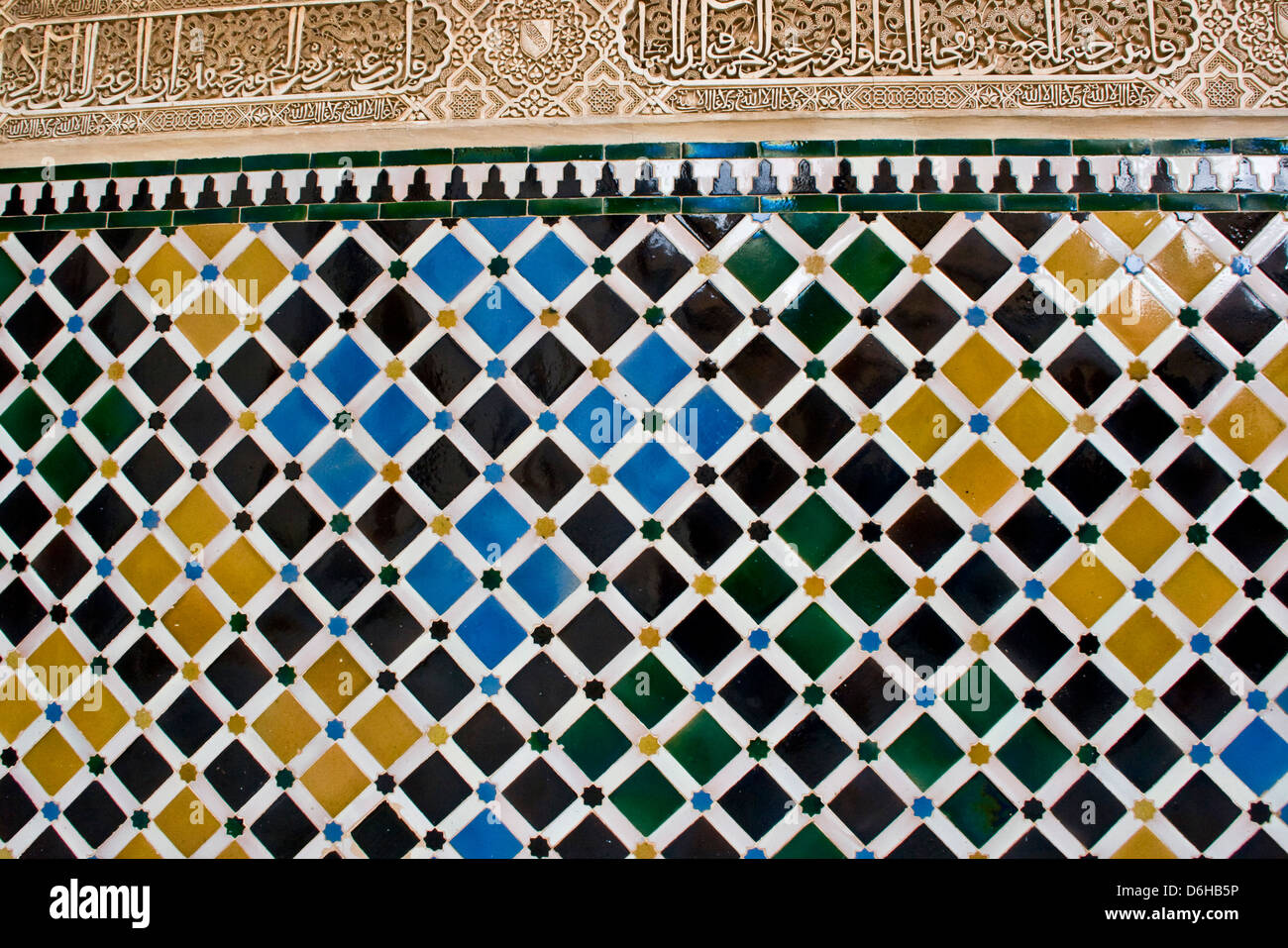 Intricate stucco Islamic artwork and repetitive tile pattern Alhambra