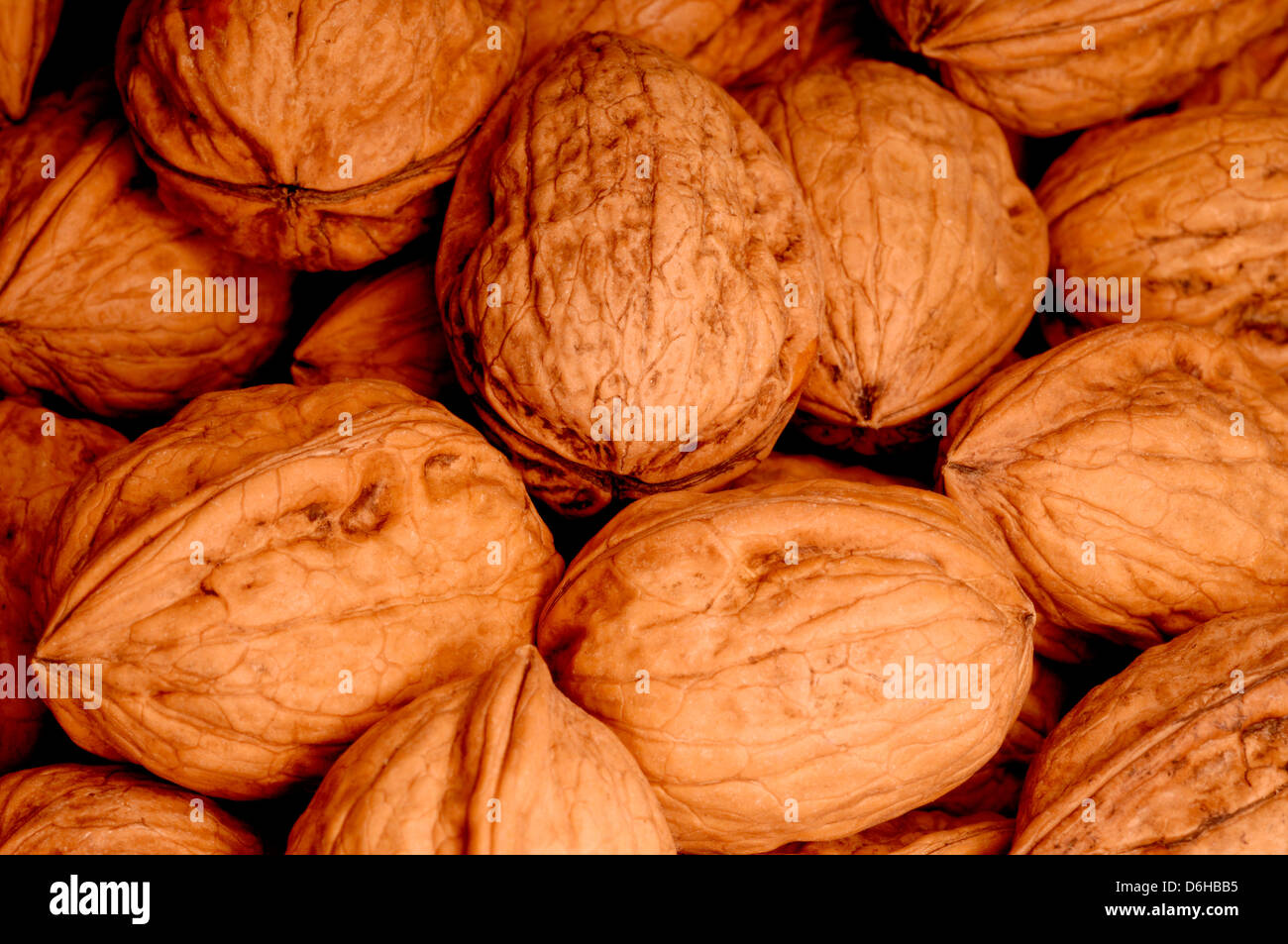 Walnuts in their shells Stock Photo Alamy