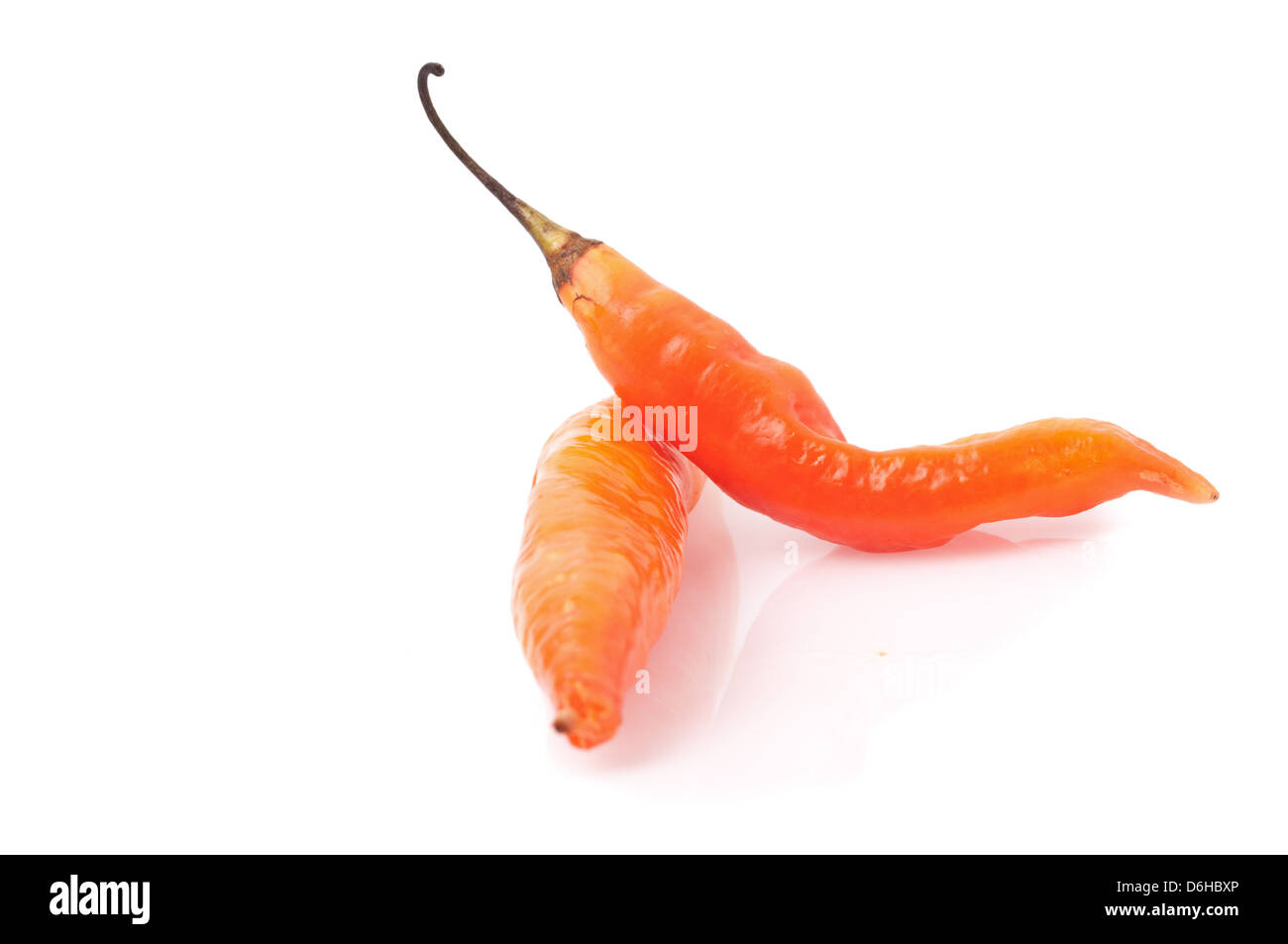 Yellow hot chili peppers on a white background Stock Photo - Alamy