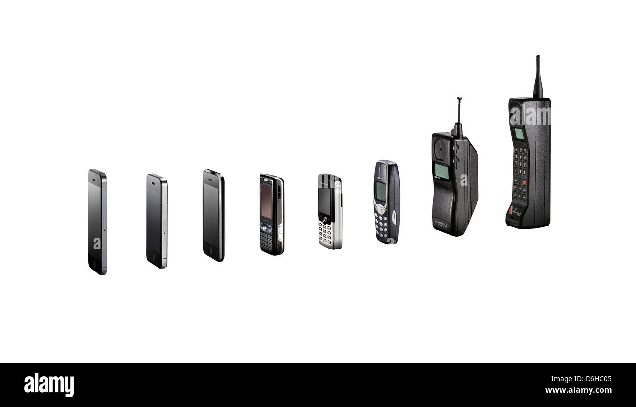 A range of mobile phones showing their evolution without shadows, shot ...