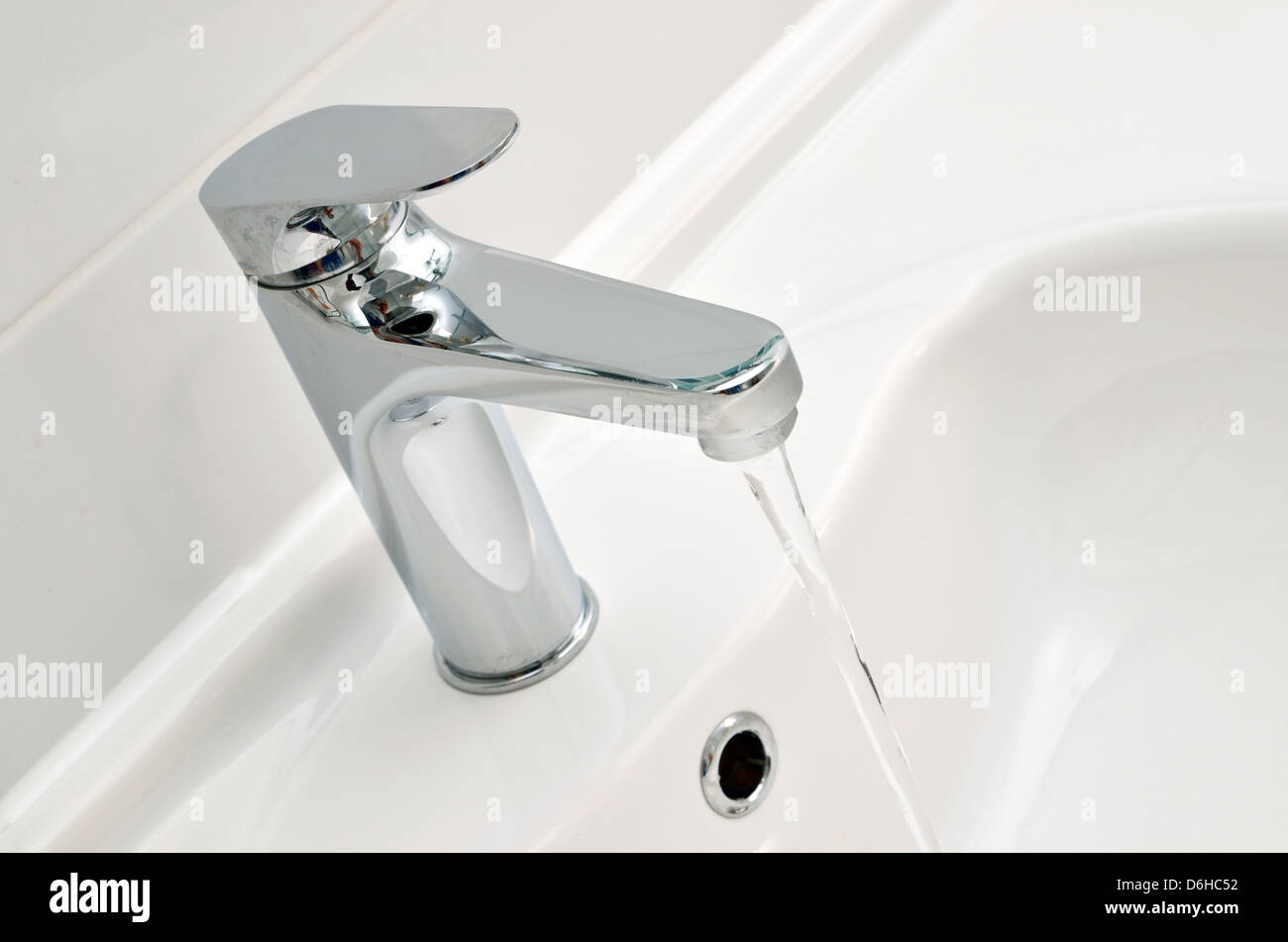 Water going down the drain Stock Photo Alamy