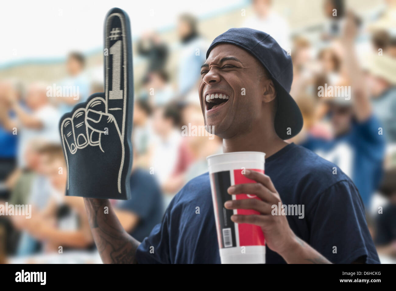 Man sports with foam and soft cup Stock Photo - Alamy