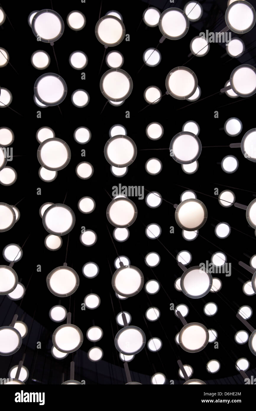 Hanging led lamps from the ceiling making a pattern Stock Photo