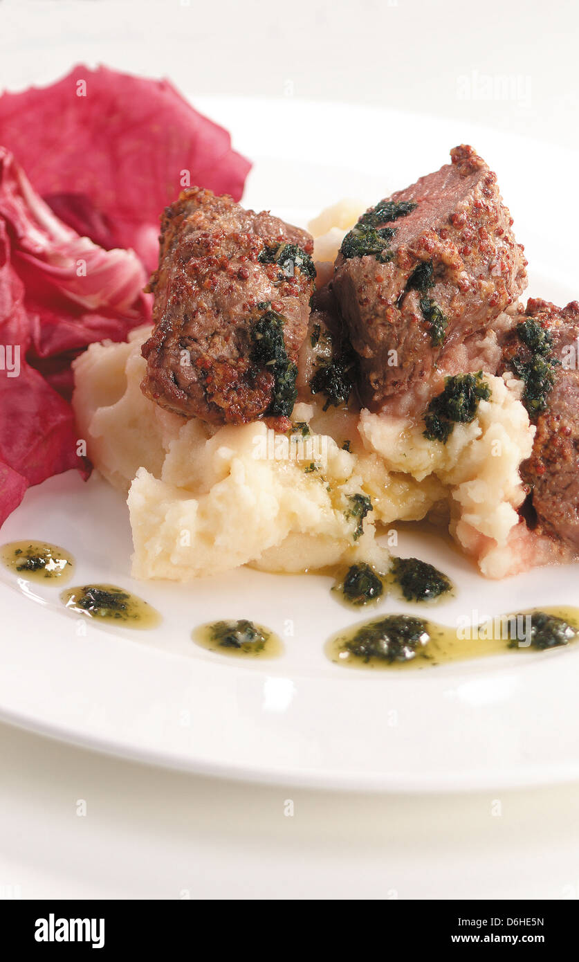 Mustard crusted lamb Stock Photo - Alamy