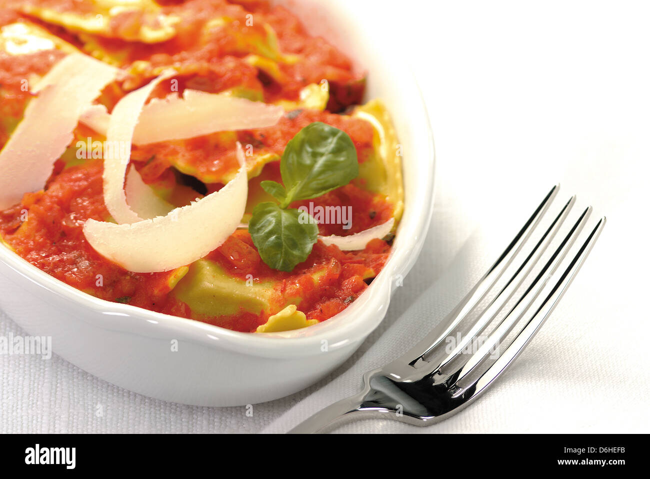Lasagne and parmesan cheese shavings Stock Photo Alamy