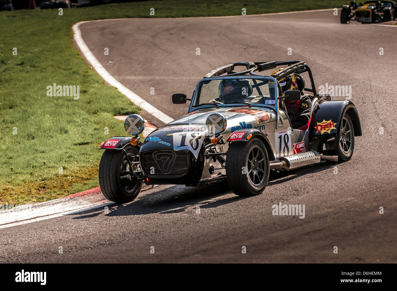 Caterham Seven sports car racing at Cadwell park race track. Stock Photo