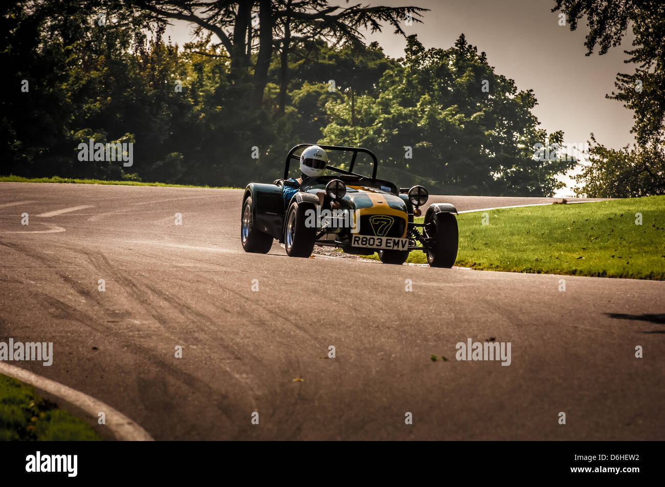 Caterham Seven sports car racing at Cadwell park race track in Lincolnshire. Stock Photo