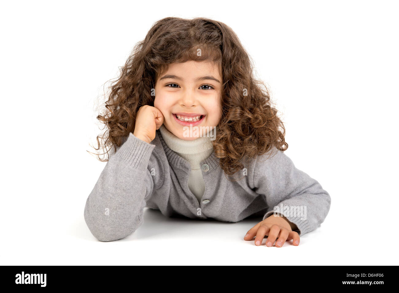 Beautiful young girl posing isolated in white Stock Photo - Alamy
