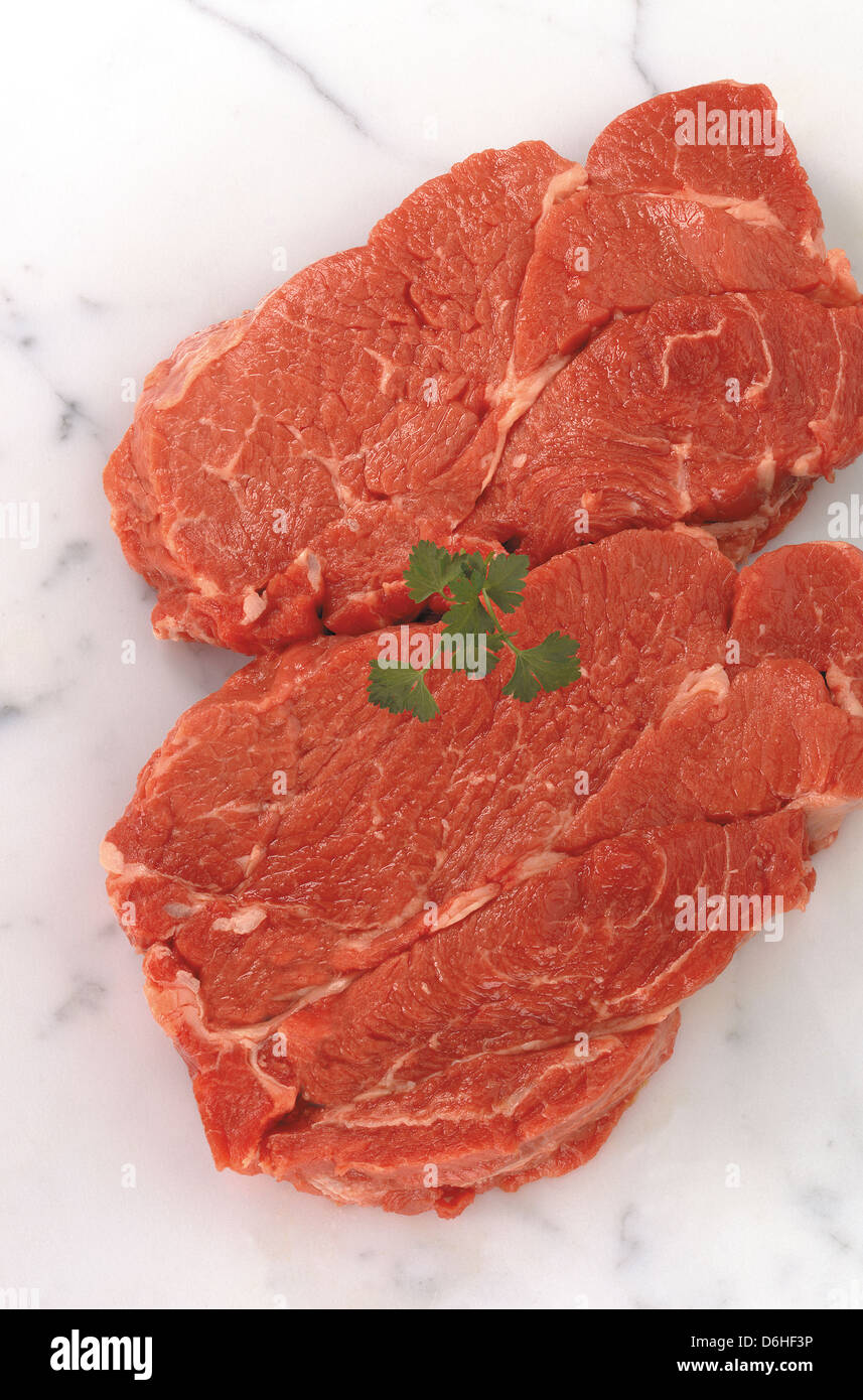 Braising steak with parsley Stock Photo Alamy