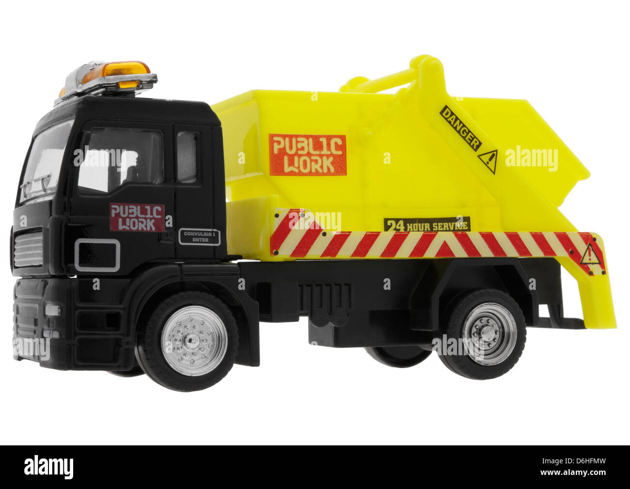 Toy skip lorry on white background Stock Photo