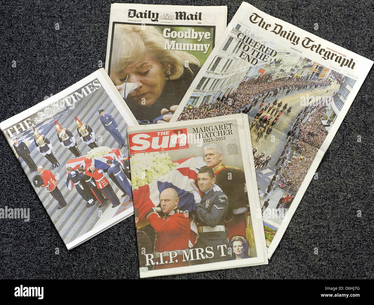 The front pages of National newspapers on Thursday 18th April 2013. The Sun, The Times, The Daily Telegraph and The Daily Mail all carrying the pictures and the story of the funeral of former Prime Minister Margaret Thatcher at St Pauls Cathedral in London on Wednesday 17th April 2013:  18 April 2013  STUART WALKER Stock Photo