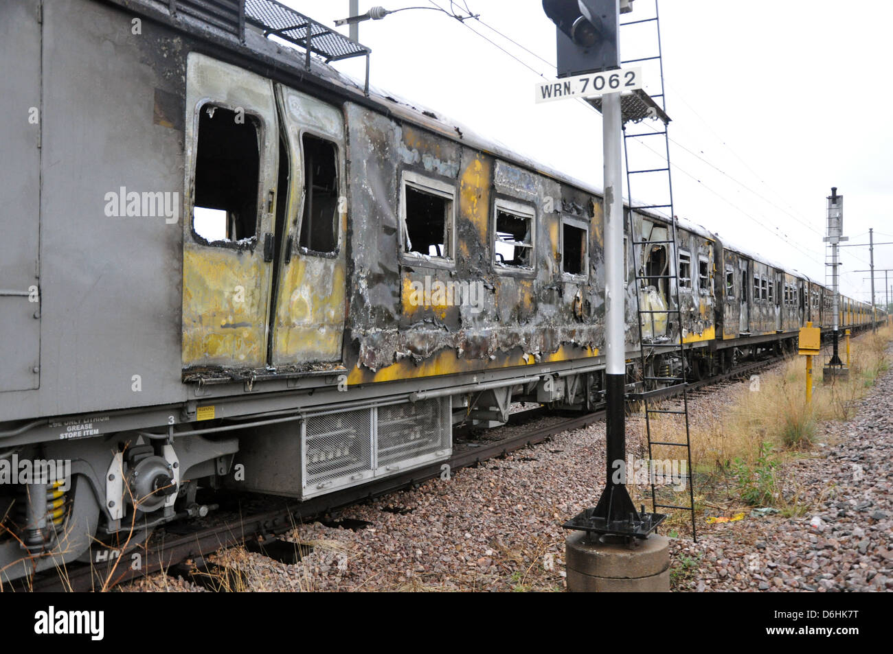 Burnt Metrorail train along Mabopane Corridor Stock Photo