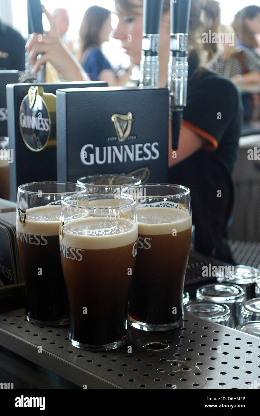 Pints of Guinness being served in the Gravity Bar at Guinness