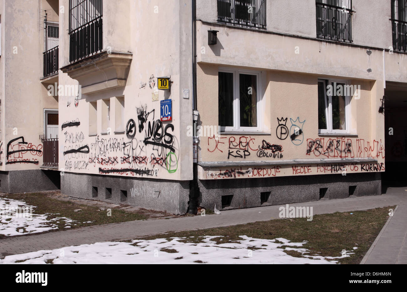 Warsaw Poland football graffiti relating to the rivalry between Polonia and Legia Warszawa on a block of flats Stock Photo